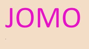 Picture showing JOMO Written In Capital Letters in pink