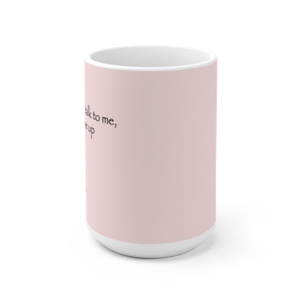 A Pastel Pink Color Cup With Black Wording