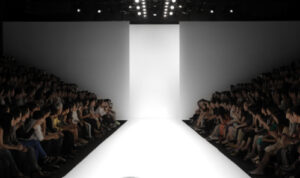 Picture of fashion show ramp with audience sitting beside