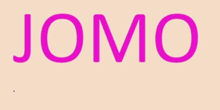 Picture showing JOMO Written In Capital Letters in pink