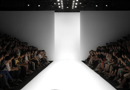 Picture of fashion show ramp with audience sitting beside